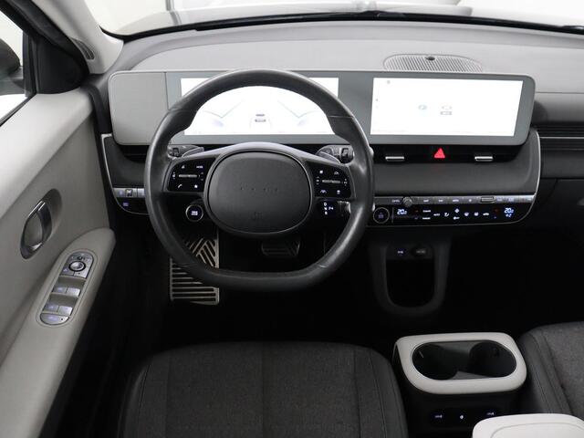 Hyundai IONIQ 5 Connect 58 kWh | SOH 91% | Warmtepomp | Stoelverwarming | Adaptive cruise | Bose Sound | Camera | Carplay | Half leder | Vehicle-to-load | Keyless | Navigatie | Full LED
