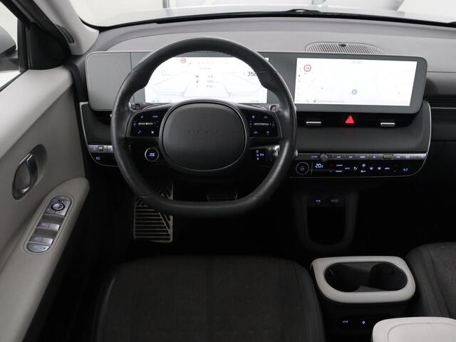 Hyundai IONIQ 5 Connect 58 kWh | SOH 100% | Stoelverwarming | Adaptive cruise | Bose Sound | Camera | Carplay | Half leder | Vehicle-to-load | Keyless | Navigatie | Full LED