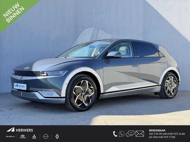 Hyundai IONIQ 5 Lounge 73kWh Automaat / SOH 100% / Panoramadak / Afneembare Trekhaak / WLTP 481 km / Warmtepomp / HUD / BOSE / 360 Camera / Apple Carplay & Android Auto / Elektr Stoelen + memory / Stoel Verwarming + Ventilatie / Navigatie / Adaptieve Cruise / DAB / Dod