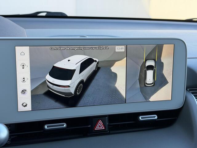 Hyundai IONIQ 5 Lounge 73kWh Automaat / SOH 100% / Panoramadak / Afneembare Trekhaak / WLTP 481 km / Warmtepomp / HUD / BOSE / 360 Camera / Apple Carplay & Android Auto / Elektr Stoelen + memory / Stoel Verwarming + Ventilatie / Navigatie / Adaptieve Cruise / DAB / Dod