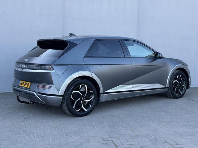 Hyundai IONIQ 5 Lounge AWD 73kWh Automaat / Trekhaak / SOH 100% / Dealer onderhouden / Fabrieksgarantie tot 12-2026 / Warmtepomp / 8 Jaar Batterij Garantie / HUD / 360 Camera / BOSE / Elektr. Stoelen met Memory Functie / Lederen Bekleding / Stoel Verwarming / Stuurwiel