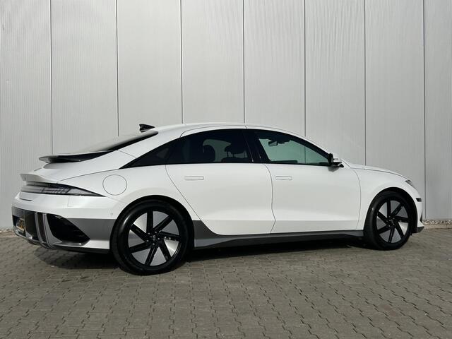 Hyundai IONIQ 6 Lounge 77.4 kWh / SOH 100% / Origineel NL Auto / 02-2030 Fabrieksgarantie / Stoel-, Stuur en Achterbankverwarming / Elektrische Stoelen / Stoelgeheugen / 360 Camera / Warmtepomp / Dodehoek Camera / HUD Display / Full Option /
