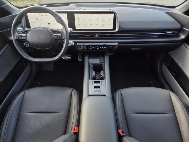 Hyundai IONIQ 6 Lounge AWD 77.4 kWh 325pk Automaat / Accu SOH 100% / Fabrieksgarantie tot 03-2029 / Trekgewicht 1.500 kg / warmtepomp / CCS snellader / Rondomzicht camera / Head Up Display / Bose Audio Systeem / Stuur- en Stoelverwarming / Elektrische achterklep / Adap