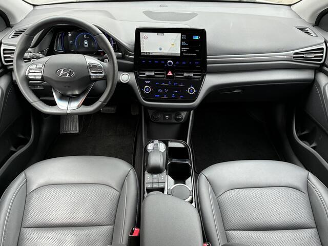Hyundai IONIQ Premium EV 38 kWh Automaat / SOH 98,1% / Dealer onderhouden / Warmtepomp / Lederen bekleding / Stuur-/Stoel-/Achterbankverwarming / Stoelventilatie / Adaptieve Cruise Control / Achteruitrijcamera /