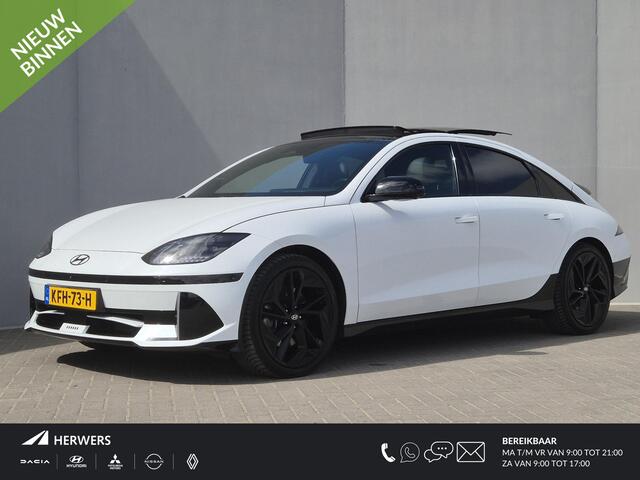 Hyundai IONIQ 6 First Edition AWD 77.4 kWh / SOH 100% / Fabrieksgarantie tot 02-2028 / Dealer onderhouden / CCS snelladen / WLTP bereik 519 km bereik stad 658 / Head Up Display / Trekgewicht 1.500 kg / Glazen schuif- en kanteldak / Stuur- Stoel & Achterbank verwarming 