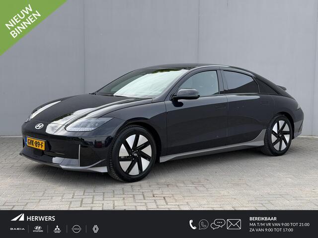 Hyundai IONIQ 6 Connect 77.4 kWh / SOH 100% / Fabrieksgarantie tot 12-2029 / HUD / Adaptieve Cruise / Warmtepomp / Navigatie / Camera / Dodehoek Detectie / Elektr. Stoel / Elektr. Achterklep / Stoel & Stuurwiel Verwarming / CCS Snelladen /