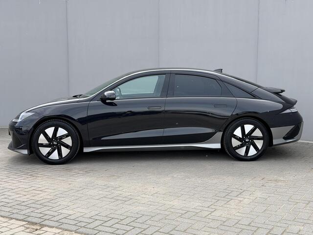 Hyundai IONIQ 6 Connect 77.4 kWh / SOH 100% / Fabrieksgarantie tot 12-2029 / HUD / Adaptieve Cruise / Warmtepomp / Navigatie / Camera / Dodehoek Detectie / Elektr. Stoel / Elektr. Achterklep / Stoel & Stuurwiel Verwarming / CCS Snelladen /