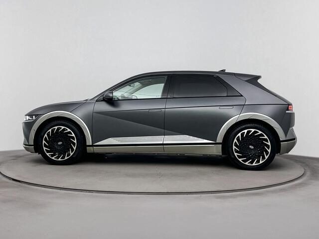 Hyundai IONIQ 5 Lounge 73kWh | SOH %97.3 | Trekhaak 1600kg | Achteruitrij camera | Apple Carplay/Android Auto | Dodehoek detectie | Elektrische stoelen |