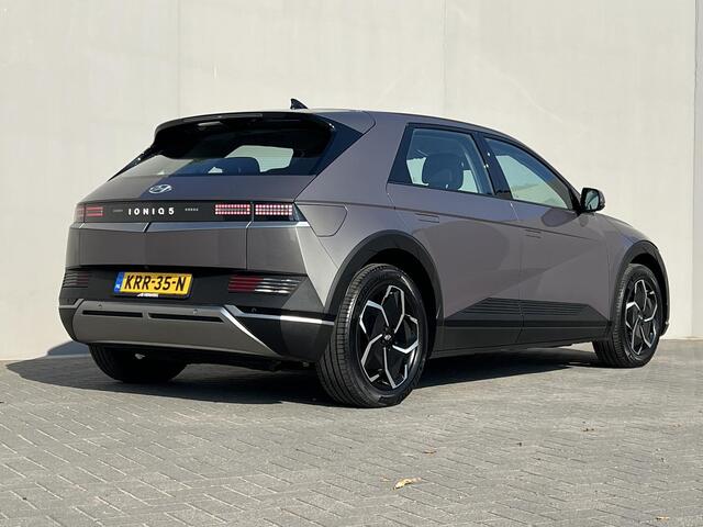 Hyundai IONIQ 5 Style 73kWh / Dealer onderhouden / Accu SoH 100 % / Fabrieksgarantie tot 05-2027 / WLTP 481 km stad 686 km / CCS snel laden / warmtepomp / 1.600 kg trekgewicht / Stuur- en stoelverwarming / Elektr. stoel / 19" LM wielen /