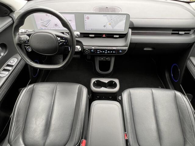Hyundai IONIQ 5 Lounge 77.4 kWh / Dealer Onderhouden/ Accu SoH 96 % / WLTP 507 km / CCS Snel Laden / Lederen Bekleding / Stoelventilatie / Elektr. Voorstoelen / Elektrische Achterklep / Stuur-, Stoel- & Achterbankverwarming / Achteruitrijamera / Navi / Apple Carplay & Android Auto / 19" LM wielen / Winterwielenset /