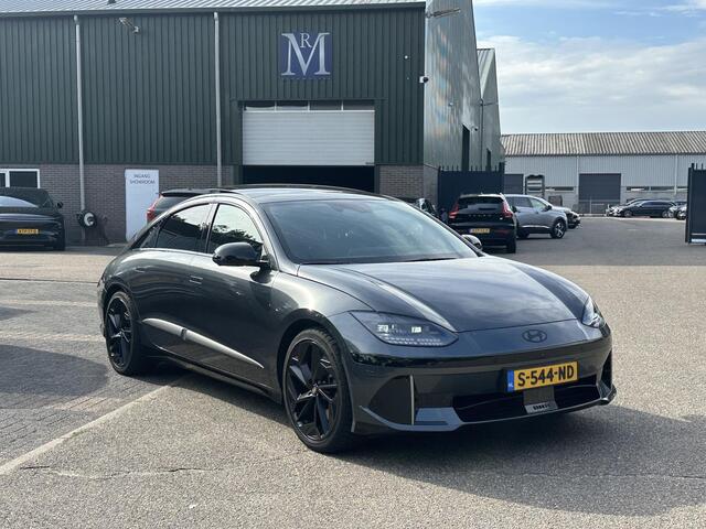 Hyundai IONIQ 6 First Edition AWD 77.4 kWh SOH 100% | PANO | STOEL VERWAMRING VOOR & ACHTER | MEM. SEAT | ELEK. STOELEN | BOSE BOXEN | 360 CAMERA | FABRIEKS GARANTIE TM 03-2028 | RIJKLAAR ! |