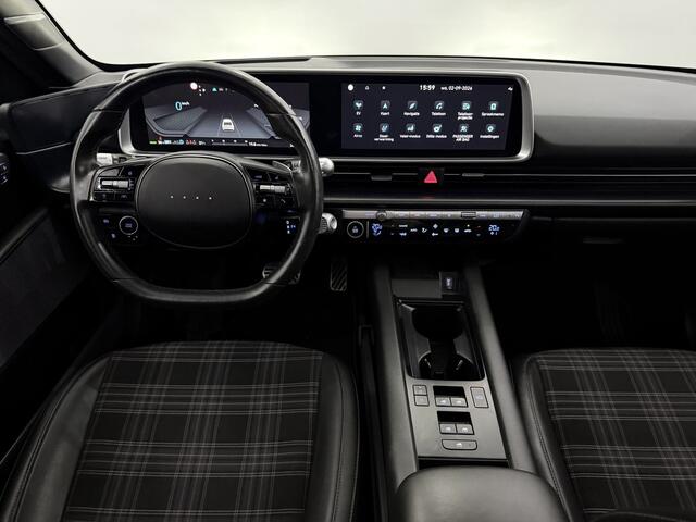 Hyundai IONIQ 6 First Edition AWD 77.4 kWh Panoramadak, 360 Camera, Navi, Stoelverwarming, Bose geluidsysteem, Memory stoelen, Elektrische achterklep, Keyless start