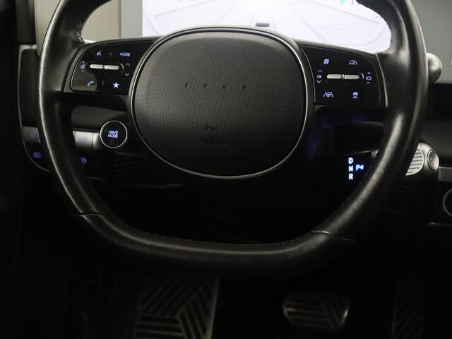 Hyundai IONIQ 5 Connect 77.4 kWh | SOH 94,1% | Half leder | Stuur/stoel verwarming Adaptive cruise | Trekhaak | BOSE sound | Camera | Park assist | Carplay | Climate control | Full LED