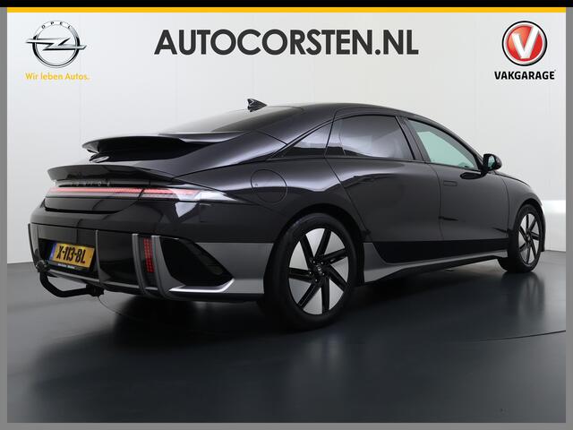 Hyundai IONIQ 6 77.4kWh 229PK Trekhaak SOH 100% Warmtepomp Adap.Cruise Head-Up Stoel+Achterbank+Stuur Verwarming Camera Navi Pdc Apple Carplay Android Auto Ecc Connect Elek. Achterklep Privacy Glas Lmv Led Lane Assist 1.500KG Trekgewicht 1e Eigenaar Origineel Nederlandse Auto