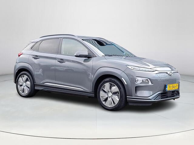 Hyundai Kona EV Premium 64 kWh | Climate control | Lederen bekleding | Navigatiesysteem | Stoelverkoeling/verwarming | Achteruitrijcamera |