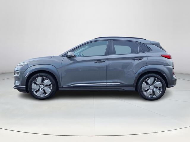 Hyundai Kona EV Premium 64 kWh | Climate control | Lederen bekleding | Navigatiesysteem | Stoelverkoeling/verwarming | Achteruitrijcamera |