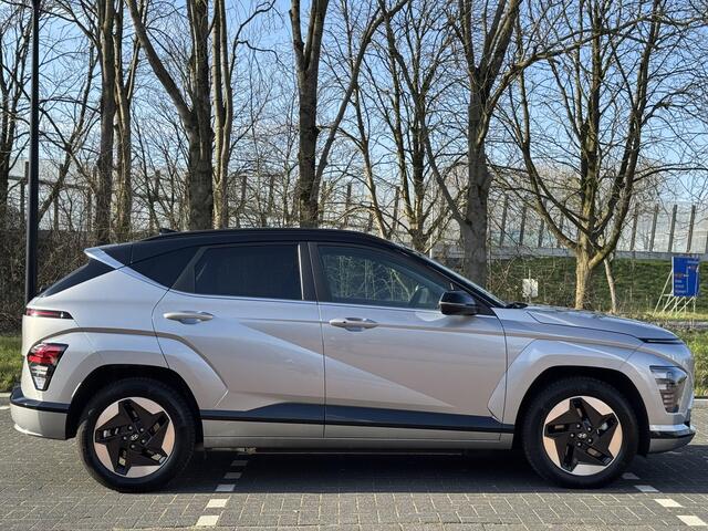 Hyundai Kona Electric Comfort Smart 65.4 kWh | Contrasterende dakkleur | Achterklep, automatisch | Head-up Display | Stoelen verwarmbaar |