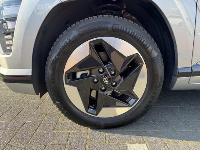 Hyundai Kona Electric Comfort Smart 65.4 kWh | Contrasterende dakkleur | Achterklep, automatisch | Head-up Display | Stoelen verwarmbaar |