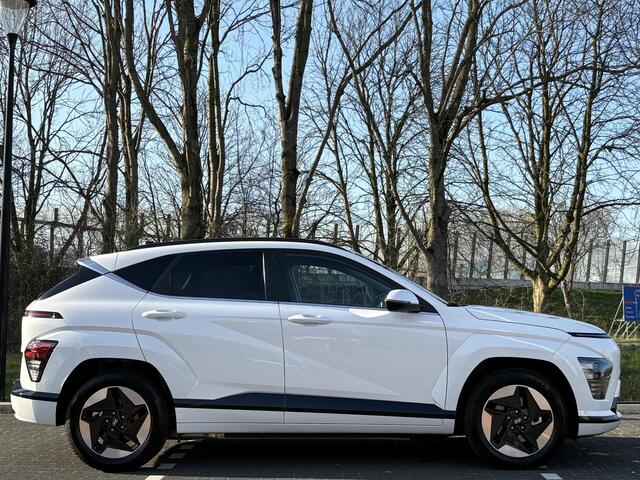 Hyundai Kona Electric Premium 65.4 kWh | Adaptieve cruisecontrol | Warmtepomp & V2L | Lederen bekleding & memory | Allseason banden |