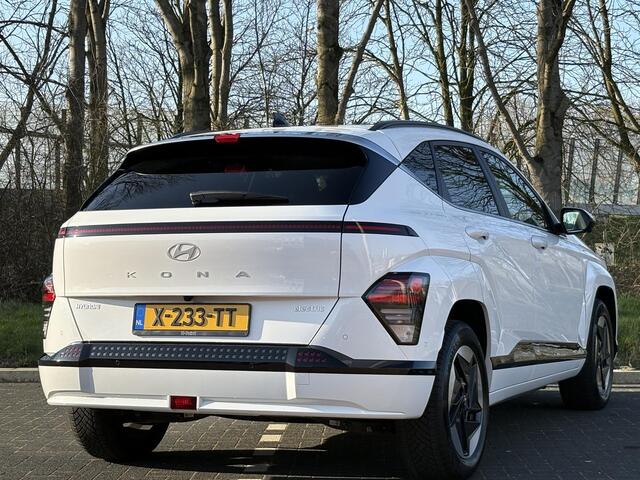 Hyundai Kona Electric Premium 65.4 kWh | Adaptieve cruisecontrol | Warmtepomp & V2L | Lederen bekleding & memory | Allseason banden |