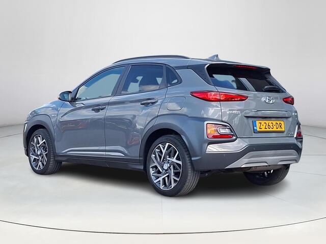 Hyundai Kona 1.6 GDI HEV Premium | Achteruitrijcamera | Stoel/stuurverwarming | Apple Carplay/Android Auto | Schuif/kanteldak | Head-up display | 36 Maanden garantie |