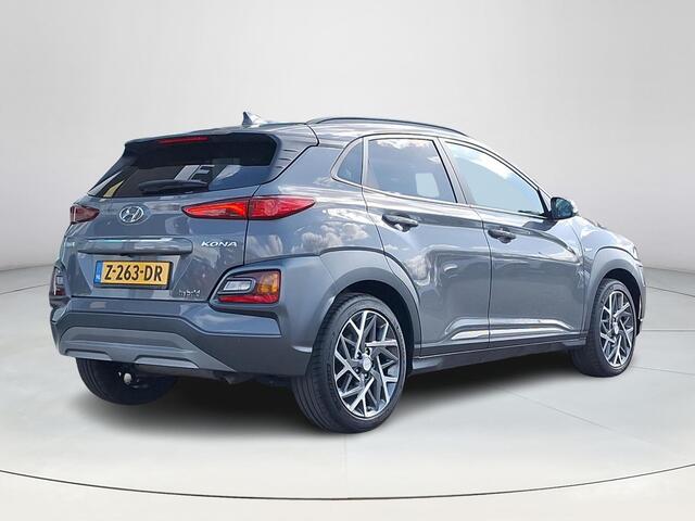 Hyundai Kona 1.6 GDI HEV Premium | Achteruitrijcamera | Stoel/stuurverwarming | Apple Carplay/Android Auto | Schuif/kanteldak | Head-up display | 36 Maanden garantie |