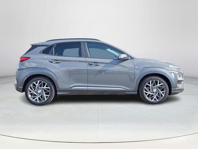 Hyundai Kona 1.6 GDI HEV Premium | Achteruitrijcamera | Stoel/stuurverwarming | Apple Carplay/Android Auto | Schuif/kanteldak | Head-up display | 36 Maanden garantie |