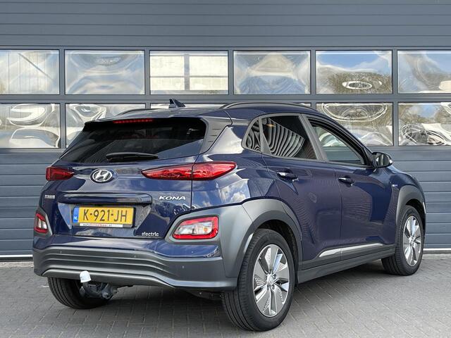 Hyundai Kona EV FASHION 64 KWH I 3 FASE I TREKHAAK I APPLE/ANDROID I ACHTERUITRIJCAMERA I ADAPTIVE CRUISE CONTROL