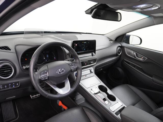 Hyundai Kona EV 64kWh 204pk Premium Leer Elektr.Schuif-K-dak Apple Carplay Android Navi Camera Elektr.Stoelen+Verwarmd+Ventilatie-koeling ! Adaptive Cruise/Stop&Go Zelfsturend MultMedia Led Keyless Dab+ Premium 484km actieradius WLTP !! Heerlijke, sterke FEV , Enorm E