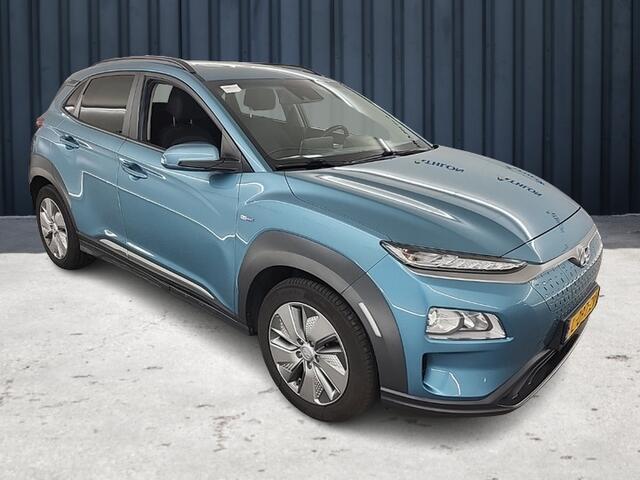 Hyundai Kona EV Fashion 64 kWh (204 PK) 2e-Eig, & Keurig-Onderh. BOVAG-Garantie. NL-Auto. Warmtepomp, Navigatie/Apple-Carplay/Android-Auto, Adaptive-Cruisecontrol, Keynes-Entry/Start, Achteruitrijcamera, Head-Up, Panoramadak, Parkeersensoren, Premium-Audio, DAB, Licht