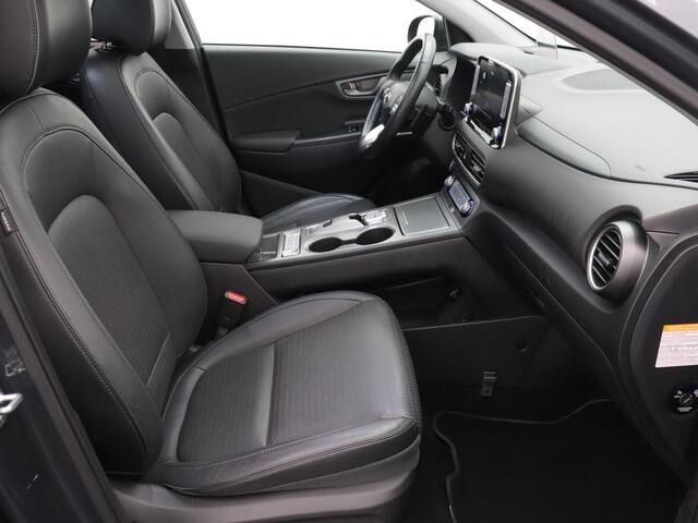 Hyundai Kona EV Premium 64 kWh 100% EV. / Schuifdak / Navigatie / Pdc+Camera / Xenon / Leder / stoelverwarming / Cruise-ctr. / Carplay / Apk sep-2025