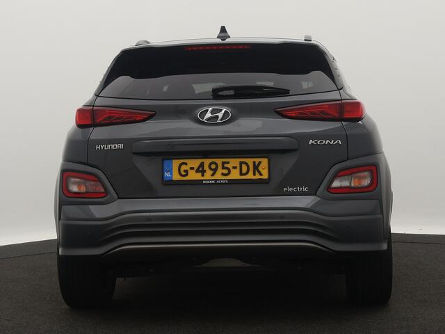 Hyundai Kona EV Premium 64 kWh 100% EV. / Schuifdak / Navigatie / Pdc+Camera / Xenon / Leder / stoelverwarming / Cruise-ctr. / Carplay / Apk sep-2025