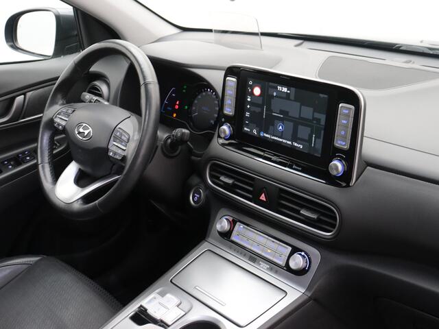 Hyundai Kona EV Premium 64 kWh 100% EV. / Schuifdak / Navigatie / Pdc+Camera / Xenon / Leder / stoelverwarming / Cruise-ctr. / Carplay / Apk sep-2025
