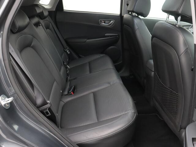 Hyundai Kona EV Premium 64 kWh 100% EV. / Schuifdak / Navigatie / Pdc+Camera / Xenon / Leder / stoelverwarming / Cruise-ctr. / Carplay / Apk sep-2025