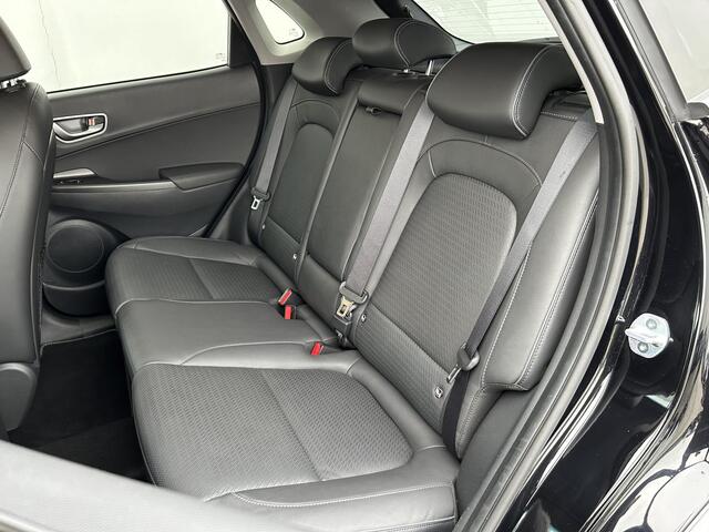 Hyundai Kona EV Premium 64 kWh / Stoel/Stuurverwarming / Stoelventilatie / 3 fase laden / Keyless / Head Up display / Elektrische stoelverstelling / Lederen bekleding /