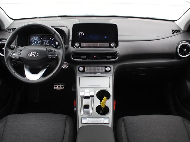 Hyundai Kona EV Fashion 39 kWh / Navigatie + Apple Carplay/Android Auto / Warmtepomp / Cruise Control Adaptief / Climate Control / Achteruitrijcamera /