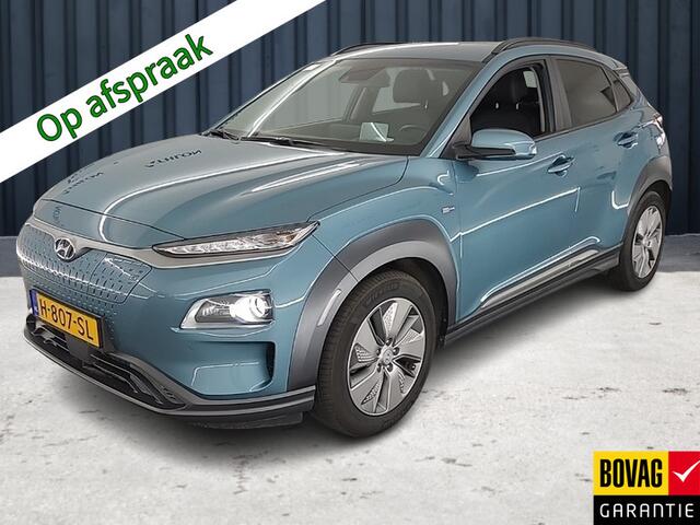 Hyundai Kona EV Premium 64 kWh (204 PK) 1e-Eig. & Keurig-Onderh. BOVAG-Garantie. NL-Auto. Warmtepomp, Half-Leer, Navigatie/Apple-Carplay/Android-Auto, Adaptive-Cruisecontrol, Keyless-Entry/Start, Parkeersensoren-V+A, Achteruitrijcamera, Head-Up, DAB, Gevent/Verw-Voors