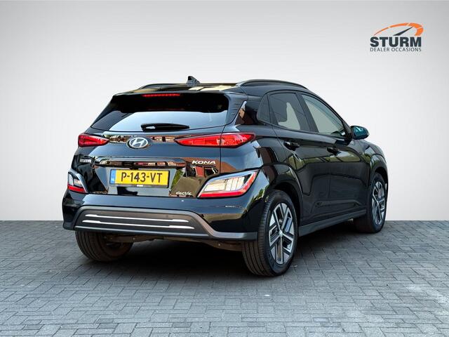 Hyundai Kona EV Fashion 64 kWh | Navigatie | Camera | Head-Up Display | Premium Audio | Adapt. Cruise Control | Dodehoek | Apple Carplay/Android Auto | Rijklaarprijs!