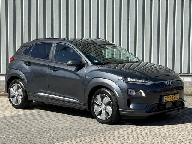 Hyundai Kona EV Premium 64 kWh / Stoel/Stuurverwarming / Stoelventilatie / Head-Up display / Keyless Entry&Start / Dodehoekdetectie / Achteruitrijcamera / Apple CarPlay/Android Auto /