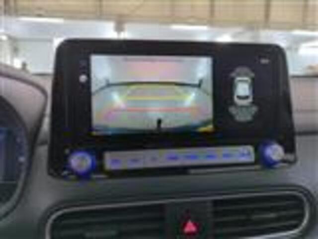 Hyundai Kona EV Premium 64 kWh warmtepomp Trekhaak Camera Vol Leder Stoelverw+koeling Two Tone