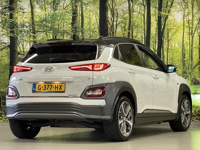 Hyundai Kona EV Premium 64 kWh | Schuif/Kanteldak | Adaptieve Cruise Control | Achteruitrijcamera | Keyless Go/Entry | Apple Carplay/Android Auto | Parkeersensoren | Lane Assist | KRELL |