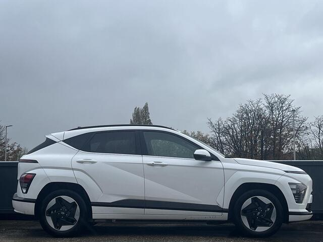 Hyundai Kona Electric Comfort Smart 65.4 kWh | Long range battery | Geïntegreerde navigatiesysteem | WinterPack | Camera | Fabrieksgarantie 12-2029 |