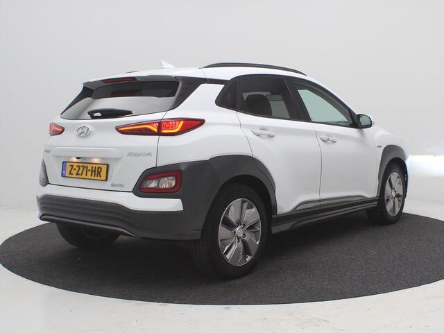 Hyundai Kona EV Fashion 64 kWh / SOH 100% / Lederen Bekleding / Navigatie / KRELL Audio / Adaptive Cruise Control / Climate Control / Achteruitrijcamera /