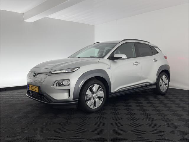 Hyundai Kona EV Fashion 64 kWh (3-Fase) {SOH-100%} (INCL-BTW) Aut * HEATPUMP | NAVI-FULLMAP | LEATHER-FABRIC | KEYLESS | CAMERA | DAB | ECC | PDC | ADAPTIVE-CRUISE | LANE-ASSIST | HEATED SEATS | PRIVACY-GLASS | HEAD-UP | SHIFT-PADDLES | 17"A