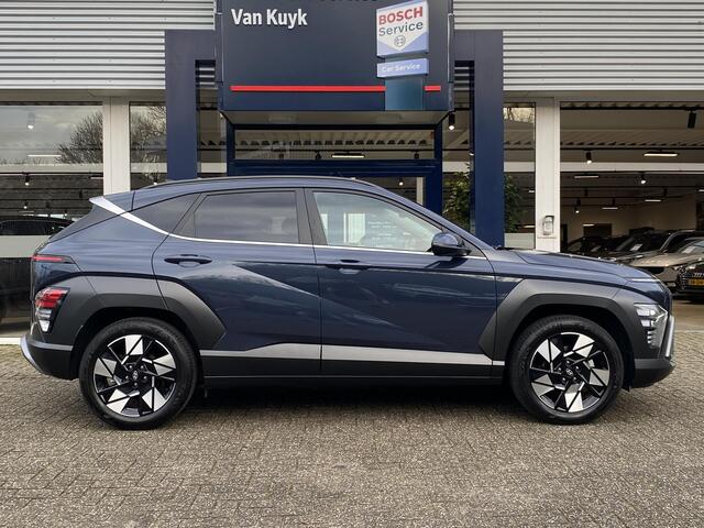 Hyundai Kona 1.6 GDI HEV Comfort Smart / Automaat / NL-Auto / 1-Ste Eigenaar / 18.000 Km / Fabrieksgarantie / Keyless / Digitaal Dashboard / LED / DAB / Apple-Carplay&Android-Auto / Navi / Camera / Stuur+Stoelverwarming / Adaptieve Cruise-Control / Lane-Assist / E-Ach