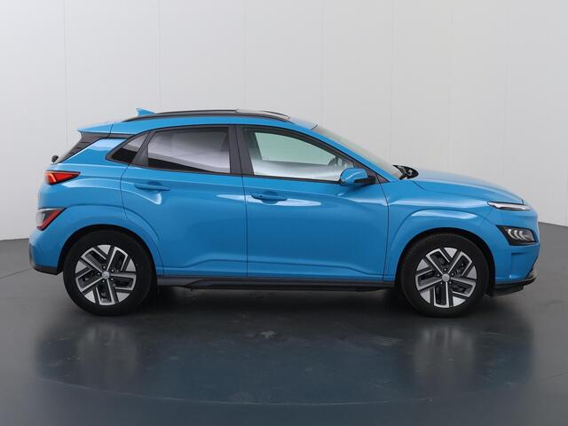 Hyundai Kona EV Limited Sky 64 kWh | Schuifdak | Head-Up | Parkeercamera | Cruise Control Adaptief | Stoelverwarming/ventilatie | Krell Audio |