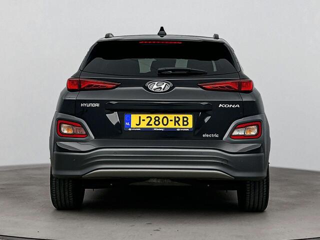 Hyundai Kona EV Premium 64 kWh | Soh 96,2% | Achterruitrij Camera | Dodehoek Detectie | Stoel verwarming & ventilatie | DAB Radio |