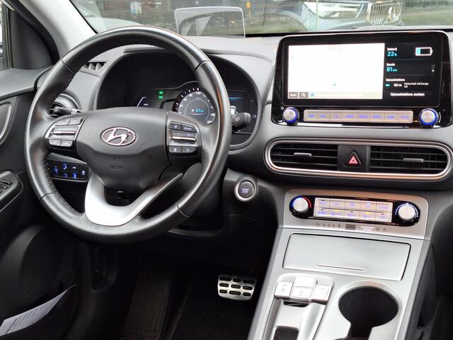 Hyundai Kona EV Fashion 64 kWh | SOH: nnb | 3 Fase | warmtepomp | HUD | Blindspot | Climate | Navi |