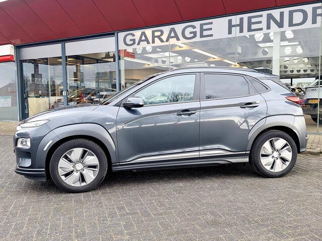Hyundai Kona EV Premium 64 kWh | SOH: 94,6% | Leder | Warmtepomp | Adaptive CC | Navi | Camera |