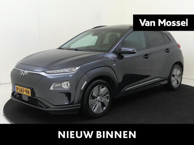 Hyundai Kona EV Premium 64 kWh | Navigatie | Elektrisch schuifdak | Stoelverwarming | Climate control | Camera |